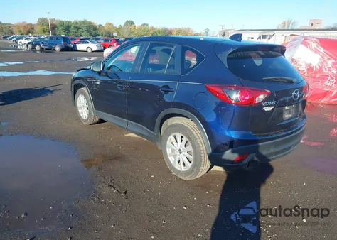 2014 Mazda Cx-5 Touring z USA, uszkodzony, nr VIN JM3KE2CYXE0322196